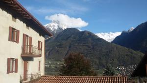 a view of a mountain range from a building at Catif Ladrù in Cerveno