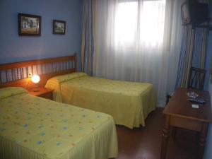 Katil atau katil-katil dalam bilik di Duque De Osuna