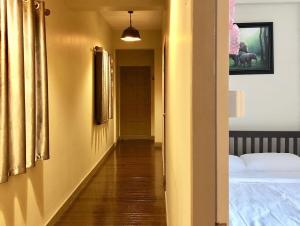 Postel nebo postele na pokoji v ubytování Achcha hotel - itsaraphap MRT station - Wat Arun