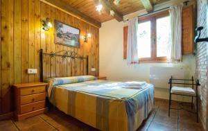 Casas Rurales Los Enebros Nerpio客房内的一张或多张床位