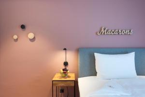 Uma cama ou camas num quarto em Hotel an der Aare Swiss Quality