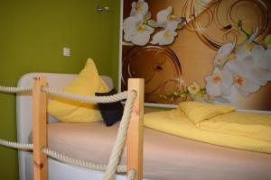 a couple of bunk beds in a room at Gast-und Weinhaus Zwiebelturm in Kerken