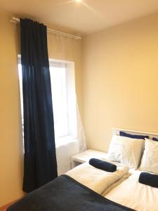 Ένα ή περισσότερα κρεβάτια σε δωμάτιο στο Budapest Airport , accommodation in Vecsés