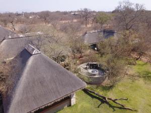 an overhead view of an old house with a roof at Call of the Wild Lodge in Hoedspruit