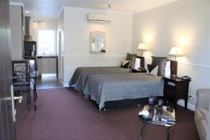 Voodi või voodid majutusasutuse Lodge Bordeaux toas