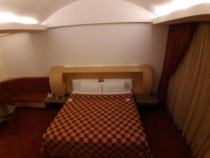 Postel nebo postele na pokoji v ubytování AUTO HOTEL LEGARIA