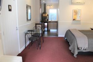 Voodi või voodid majutusasutuse Lodge Bordeaux toas