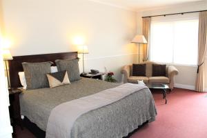 Voodi või voodid majutusasutuse Lodge Bordeaux toas