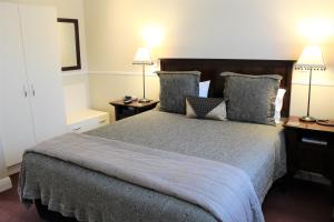 Voodi või voodid majutusasutuse Lodge Bordeaux toas