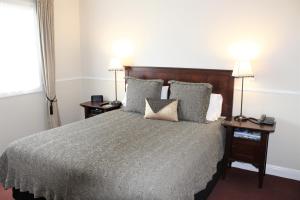 Voodi või voodid majutusasutuse Lodge Bordeaux toas