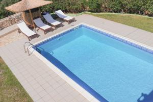 Swimming pool sa o malapit sa Kefalos Villas