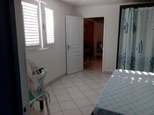 Postel nebo postele na pokoji v ubytování La Villa Jasmin
