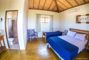 Giường trong phòng chung tại Pousada Mirante do Cerrado