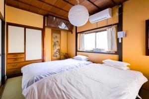 Posteľ alebo postele v izbe v ubytovaní Family house (private house)