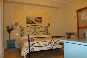 Postel nebo postele na pokoji v ubytování Hotel Ismaele