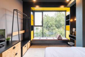 LOBSUEK Hostel客房内的一张或多张床位