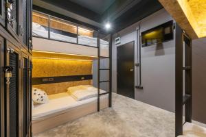 LOBSUEK Hostel客房内的一张或多张床位