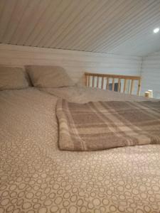 Postel nebo postele na pokoji v ubytování Cozy Cottage - Free WIFI and Parking