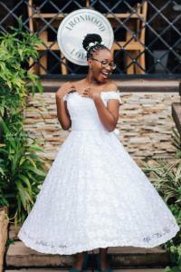 a woman in a white dress posing for a picture at IRONWOOD LODGE in Pennington