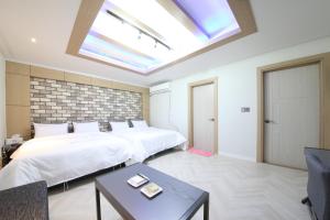 Eco Hotel客房内的一张或多张床位