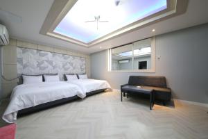 Eco Hotel客房内的一张或多张床位