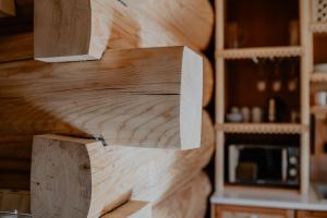 a piece of wood is taped to a wall at Biolo i Corno Izba Mountain Chalets in Kościelisko