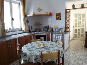 Kuchyňa alebo kuchynka v ubytovaní Casa Maria Cristina Maxi