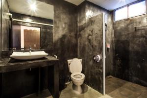 Koupelna v ubytování Baan Suan Ta Hotel