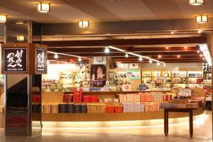 a store front of a store with a lot of products at Hotel Towadaso in Towada