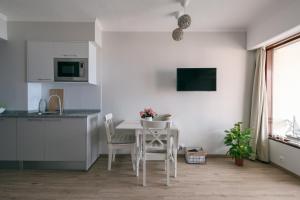 Μια τηλεόραση ή/και κέντρο ψυχαγωγίας στο BINIS Apartment +3 φωτογραφίες
