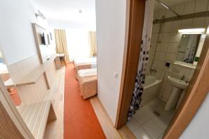 Een badkamer bij Hotel Gallant