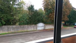 a view of a street from a bus window at Studio lumineux et confortable in Chaumont