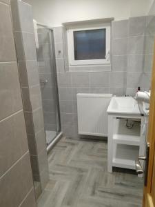 Koupelna v ubytování Hotel - penzion M&M