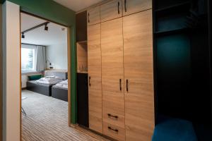Postel nebo postele na pokoji v ubytování Hotel Halo Szczyrk