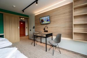 TV a/nebo společenská místnost v ubytování Hotel Halo Szczyrk