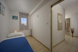 Postel nebo postele na pokoji v ubytování Apartment Tea