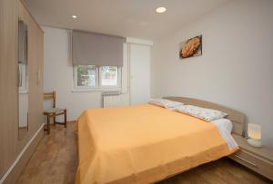 Postel nebo postele na pokoji v ubytování Apartment Tea