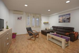 TV a/nebo společenská místnost v ubytování Apartment Tea