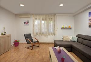 Posezení v ubytování Apartment Tea