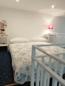 Postel nebo postele na pokoji v ubytování CASA SACA'