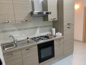 Η κουζίνα ή μικρή κουζίνα στο Le tre orchidee