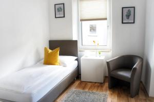 Posteľ alebo postele v izbe v ubytovaní Schwarzacherhof Pension & Apartments