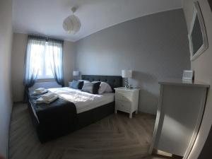 Posteľ alebo postele v izbe v ubytovaní SnowApart w Villi Avangarda