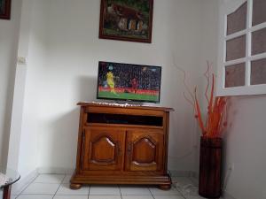 TV a/nebo společenská místnost v ubytování VILLA C'MARGOT