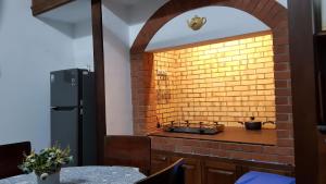 Kuchyň nebo kuchyňský kout v ubytování CHARAKAMA Guest Bungalow - GAMPAHA