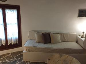 Postel nebo postele na pokoji v ubytování Villa Mantalena