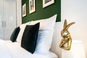 Łóżko lub łóżka w pokoju w obiekcie Boutique Design-Apartments Vienna