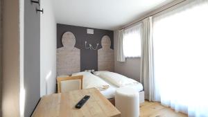 Postel nebo postele na pokoji v ubytování Chalet C'Est La Vie