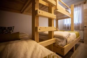 a bedroom with two bunk beds in a room at Nirvana in Sierra Nevada