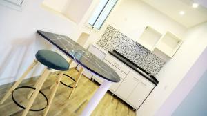 Kuchyň nebo kuchyňský kout v ubytování Hamilton Suites & Appart